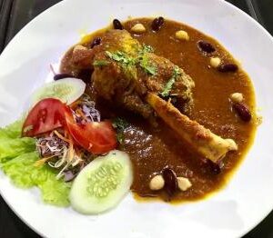 218. Lamb Shank Curry