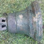 Buried church bell found in Poland after decades hidden beneath roadside